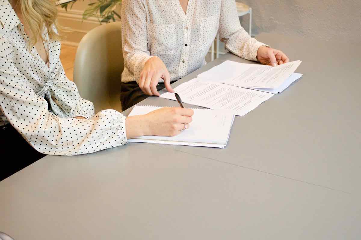 Maryland Property Group team reviewing a property management plan with an owner